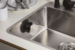 Hållare till disktrasa