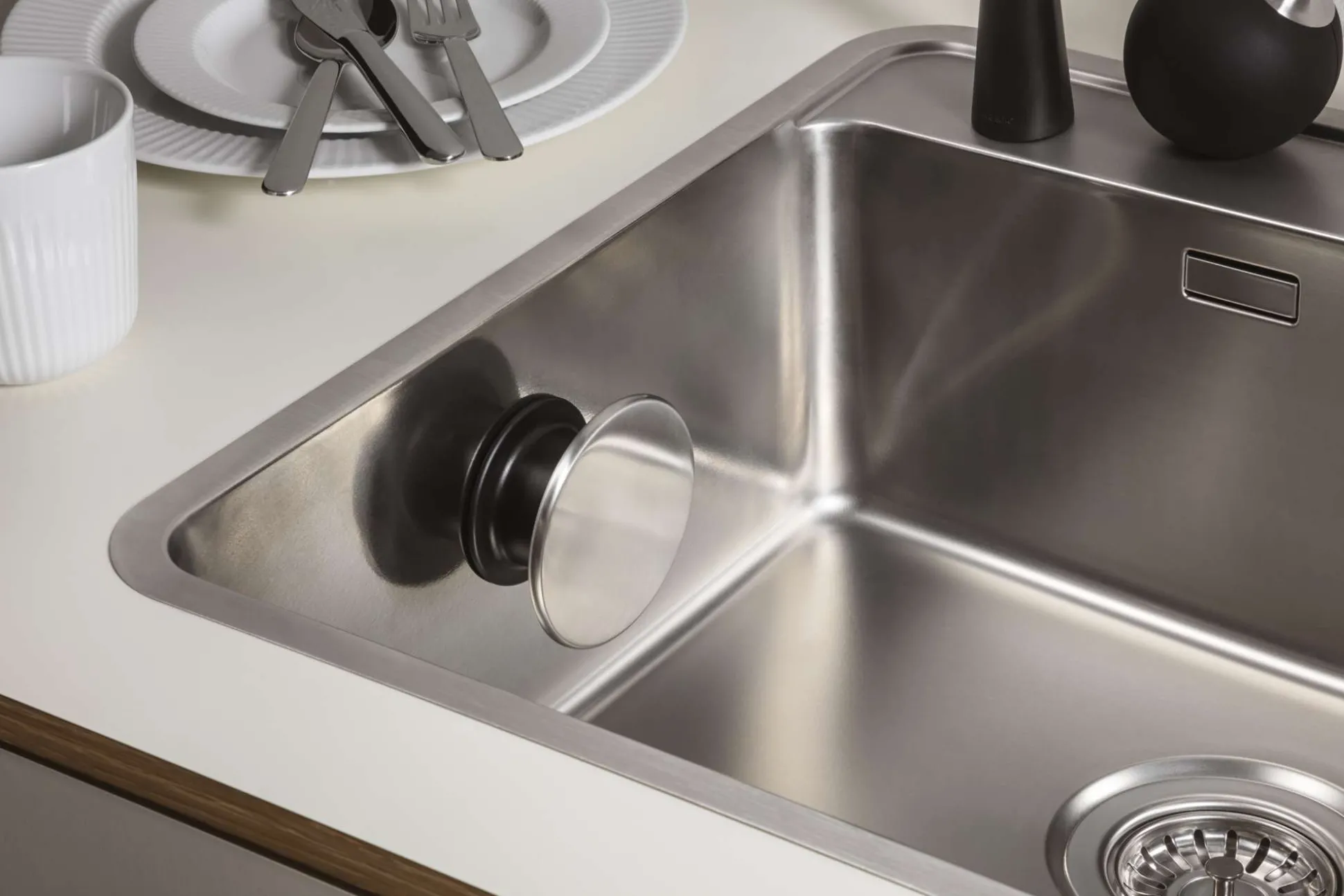 Hållare till disktrasa